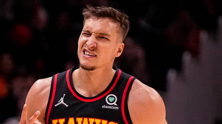 Mar 20, 2022; Atlanta, Georgia, USA; Atlanta Hawks guard Bogdan Bogdanovic (13) reacts after hitting a three point shot against the New Orleans Pelicans during the second half at State Farm Arena. Mandatory Credit: Dale Zanine-USA TODAY Sports
