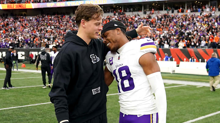 Dec 16, 2023; Cincinnati, Ohio, USA; Former Louisiana State University teammates, Cincinnati Bengals quarterback Joe Burrow (9), left, and Minnesota Vikings wide receiver Justin Jefferson (18) great each other after the game at Paycor Stadium. Dec 16, 2023; Cincinnati, Ohio, USA; Former Louisiana State University teammates, Cincinnati Bengals quarterback Joe Burrow (9), left, and Minnesota Vikings wide receiver Justin Jefferson (18) great each other after the game at Paycor Stadium.
