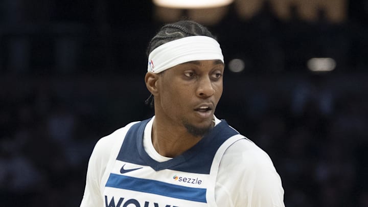 Mar 18, 2026; Minneapolis, Minnesota, USA; Minnesota Timberwolves forward Jaden McDaniels (3) dribbles the ball against the Utah Jazz in the first half at Target Center. Mandatory Credit: Jesse Johnson-Imagn Images