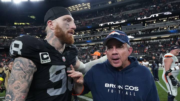 Las Vegas Raiders defensive end Maxx Crosby (98) and Denver Broncos head coach Sean Payton Las Vegas Raiders defensive end Maxx Crosby (98) and Denver Broncos head coach Sean Payton