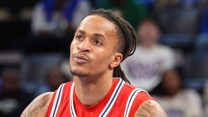 Feb 23, 2025; Memphis, Tennessee, USA; Florida Atlantic Owls forward Kaleb Glenn (1) reacts after a three point basket against the Memphis Tigers during the first half at FedExForum.