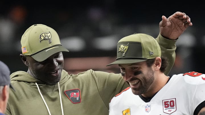 Tampa Bay Buccaneers head coach Todd Bowles and quarterback Baker Mayfield (6) celebrate a win over the New Orleans Saints Tampa Bay Buccaneers head coach Todd Bowles and quarterback Baker Mayfield (6) celebrate a win over the New Orleans Saints