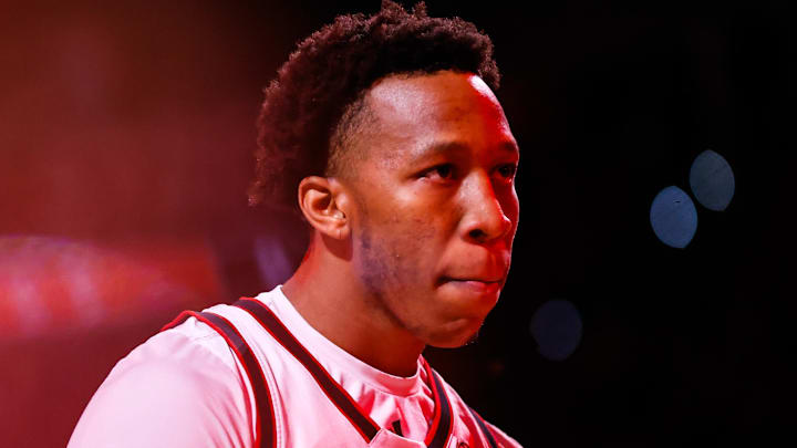 Jan 27, 2026; Raleigh, North Carolina, USA;  (EDITOR'S NOTE: Image created using a radial filter) NC State Wolfpack guard Quadir Copeland (11) looks on before the first half of the game against the Syracuse Orange at Lenovo Center. Mandatory Credit: Jaylynn Nash-Imagn Images