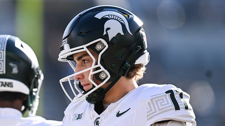 Nov 22, 2025; Iowa City, Iowa, USA; Michigan State Spartans quarterback Alessio Milivojevic (11) looks on before the game against the Iowa Hawkeyes at Kinnick Stadium. Mandatory Credit: Jeffrey Becker-Imagn Images