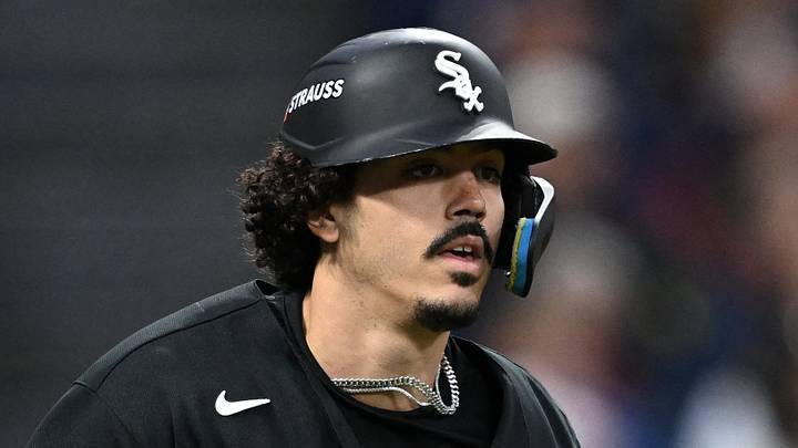 Oct 5, 2026; Cleveland, Ohio, USA;  Chicago White Sox third baseman Miguel Vargas (20) singles against the Cleveland Guardians during the sixth inning in game two of the ALDS for the 2026 MLB Playoffs at Progressive Field.  Mandatory Credit: David Dermer-Imagn Images