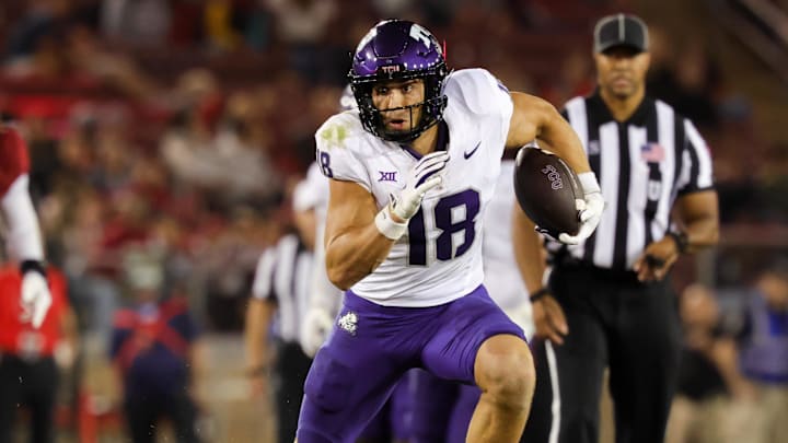 Aug 30, 2024; Stanford, California, USA; TCU Horned Frogs wide receiver Jack Bech (18) runs with the ball past Stanford Cardinal safety Scotty Edwards (21) during the second half at Stanford Stadium. 