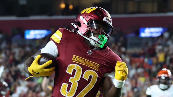 Washington Commanders running back Jacory Croskey-Merritt scores a touchdown past Cincinnati Bengals safety Daijahn Anthony. Washington Commanders running back Jacory Croskey-Merritt scores a touchdown past Cincinnati Bengals safety Daijahn Anthony.