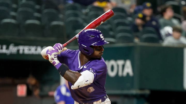 Kansas State Wildcats junior infielder Dee Kennedy anticipates a pitch that he hit for a home run in Arlington, Texas at Globe Life Field.