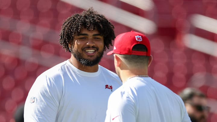 Tampa Bay Buccaneers offensive tackle Tristan Wirfs (78) and quarterback Baker Mayfield (6)