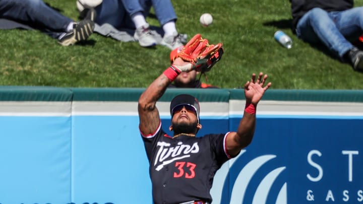 Feb 23, 2026; Lakeland, Florida, USA; Minnesota Twins center fielder Emmanuel Rodriguez (33) catches a fly ball during the third inning against the Detroit Tigers at Publix Field at Joker Marchant Stadium. Mandatory Credit: Mike Watters-Imagn Images Feb 23, 2026; Lakeland, Florida, USA; Minnesota Twins center fielder Emmanuel Rodriguez (33) catches a fly ball during the third inning against the Detroit Tigers at Publix Field at Joker Marchant Stadium. Mandatory Credit: Mike Watters-Imagn Images