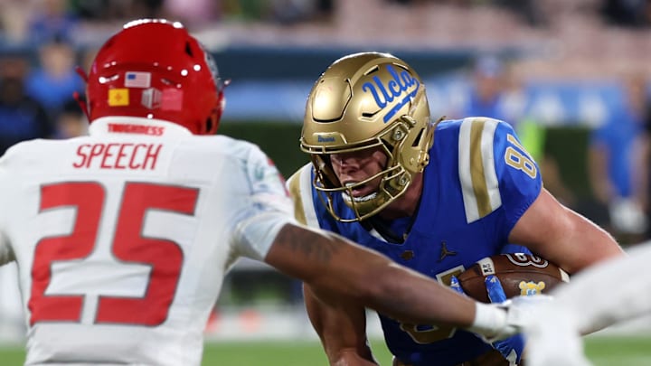 Sep 12, 2025; Pasadena, California, USA;  UCLA Bruins defensive lineman Tyler Partlow (81) runs with the ball after making a catch during the second quarter against the New Mexico Lobos at Rose Bowl. Mandatory Credit: Kiyoshi Mio-Imagn Images