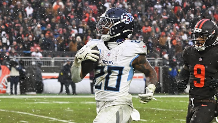 Dec 7, 2025; Cleveland, Ohio, USA; Tennessee Titans running back Tony Pollard (20) runs for a thirty-two yard touchdown against Cleveland Browns safety Grant Delpit (9) during the third quarter at Huntington Bank Field. Mandatory Credit: Ken Blaze-Imagn Images Dec 7, 2025; Cleveland, Ohio, USA; Tennessee Titans running back Tony Pollard (20) runs for a thirty-two yard touchdown against Cleveland Browns safety Grant Delpit (9) during the third quarter at Huntington Bank Field. Mandatory Credit: Ken Blaze-Imagn Images