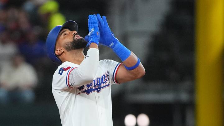May 26, 2026; Arlington, Texas, USA; Texas Rangers second baseman Ezequiel Duran (20) reacts at second base after hitting an RBI double against the Houston Astros during the first inning at Globe Life Field. Mandatory Credit: Raymond Carlin III-Imagn Images May 26, 2026; Arlington, Texas, USA; Texas Rangers second baseman Ezequiel Duran (20) reacts at second base after hitting an RBI double against the Houston Astros during the first inning at Globe Life Field. Mandatory Credit: Raymond Carlin III-Imagn Images