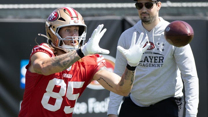 Jun 10, 2025; Santa Clara, CA, USA; San Francisco 49ers tight end George Kittle (85) works out with his teammates during an OTA at Levi's Stadium. Mandatory Credit: D. Ross Cameron-Imagn Images