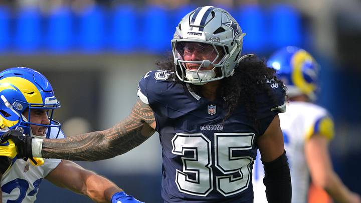 Dallas Cowboys linebacker Marist Liufau grabs a hold of Los Angeles Rams running back Cody Schrader at SoFi Stadium Dallas Cowboys linebacker Marist Liufau grabs a hold of Los Angeles Rams running back Cody Schrader at SoFi Stadium