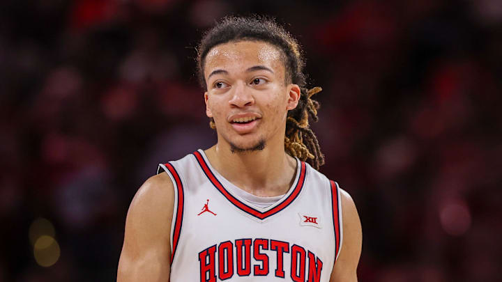 Mar 4, 2026; Houston, Texas, USA; Houston Cougars guard Kingston Flemings (4) reacts while playing against the Baylor Bears in the second half at Fertitta Center.