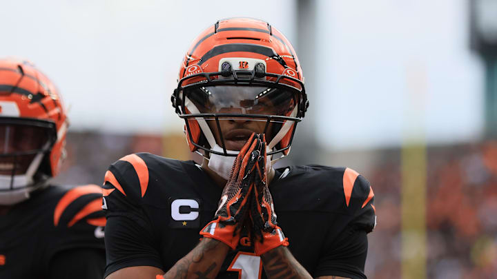 Dec 28, 2025; Cincinnati, Ohio, USA; Cincinnati Bengals wide receiver Ja'Marr Chase (1) celebrates after a touchdown against the Arizona Cardinals during the first half at Paycor Stadium. Mandatory Credit: Katie Stratman-Imagn Images