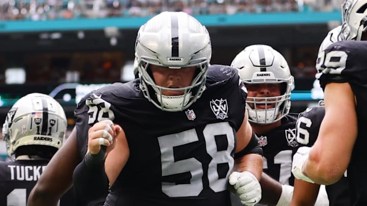 Nov 17, 2024; Miami Gardens, Florida, USA; Las Vegas Raiders tight end Brock Bowers (89) celebrates with guard Jackson Powers-Johnson (58) after scoring a touchdown against the Miami Dolphins during the third quarter at Hard Rock Stadium. Mandatory Credit: Sam Navarro-Imagn Images