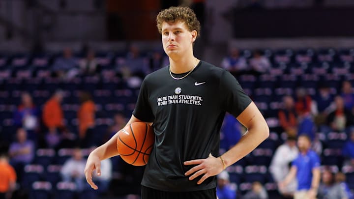 Jan 25, 2025; Gainesville, Florida, USA; Florida Gators center Micah Handlogten (3) watches warmups before a game against the Georgia Bulldogs at Exactech Arena at the Stephen C. O'Connell Center. Mandatory Credit: Matt Pendleton-Imagn Images Jan 25, 2025; Gainesville, Florida, USA; Florida Gators center Micah Handlogten (3) watches warmups before a game against the Georgia Bulldogs at Exactech Arena at the Stephen C. O'Connell Center. Mandatory Credit: Matt Pendleton-Imagn Images