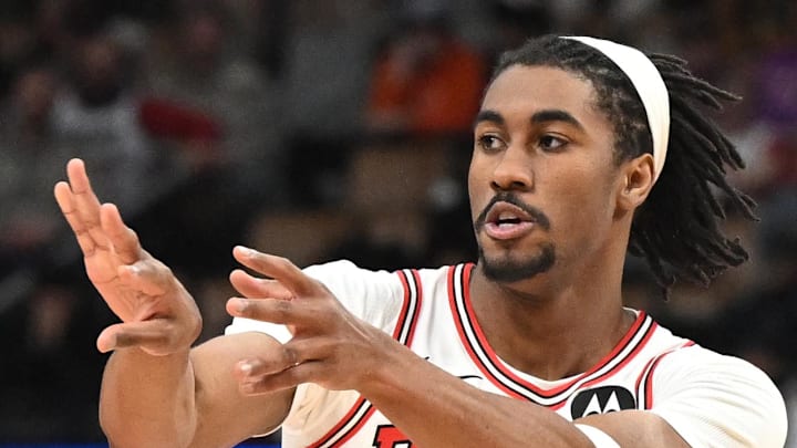 Feb 5, 2026; Toronto, Ontario, CAN;  Chicago Bulls guard Jaden Ivey (31) passes against the Toronto Raptors in the second half at Scotiabank Arena. Mandatory Credit: Dan Hamilton-Imagn Images
