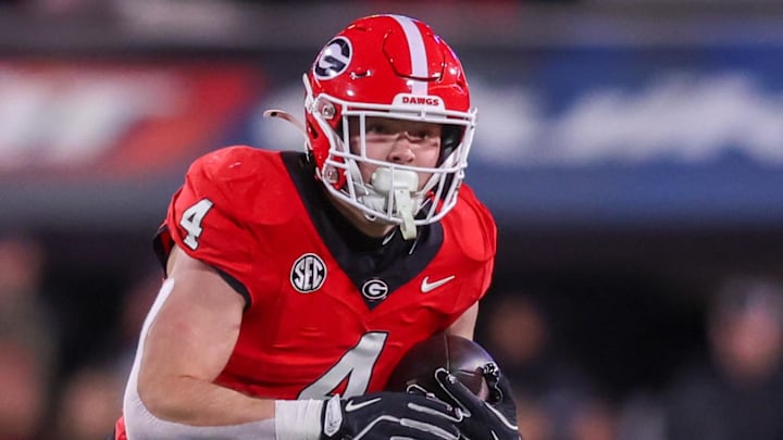 Nov 29, 2024; Athens, Georgia, USA; Georgia Bulldogs tight end Oscar Delp (4) runs after a catch against the Georgia Tech Yellow Jackets in the fourth quarter at Sanford Stadium. Mandatory Credit: Brett Davis-Imagn Images