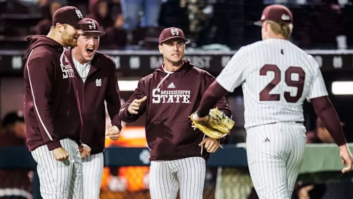 Mississippi State Pitcher Stone Simmons (#17), Mississippi State Pitcher Kevin Mannell (#48), Mississippi State Infielder/Outfielder Aaron Downs (#5) and Mississippi State Pitcher Nate Williams (#29) during the game between the Ole Miss Rebels and the Mississippi State Bulldogs at Dudy Noble Field at Polk-Dement Stadium in Starkville, MS.