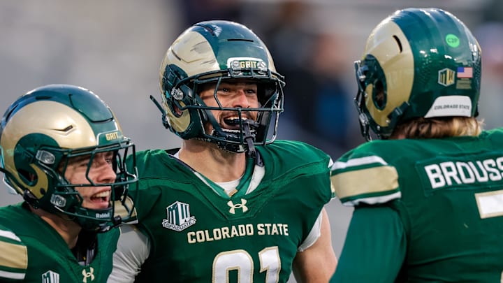 Colorado State Rams tight end Rocky Beers (81) celebrates his touchdown with quarterback Jackson Brousseau (7) and wide receiver Tommy Maher (10) in the fourth quarter against the Air Force Falcons at Sonny Lubick Field at Canvas Stadium. 