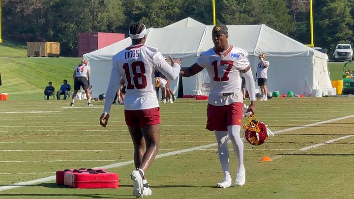 Washington Commanders wide receivers Stefon Diggs and Terry McLaurin greet each other during Friday’s training camp practice in Ashburn, Va. Washington Commanders wide receivers Stefon Diggs and Terry McLaurin greet each other during Friday’s training camp practice in Ashburn, Va.