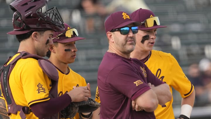 Arizona State manager Willie Bloomquist makes a pitching change during the seventh inning against Ohio State at Phoenix Municipal Stadium on Feb. 16, 2025.