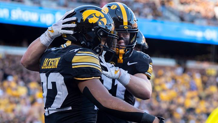 Iowa Hawkeyes running back Braeden Jackson (22) celebrates with teammate DJ Vonnahme (81) after scoring a touchdown during a Big Ten college football game against the Ohio State Buckeyes Oct. 3, 2026 at Kinnick Stadium in Iowa City, Iowa. Iowa Hawkeyes running back Braeden Jackson (22) celebrates with teammate DJ Vonnahme (81) after scoring a touchdown during a Big Ten college football game against the Ohio State Buckeyes Oct. 3, 2026 at Kinnick Stadium in Iowa City, Iowa.