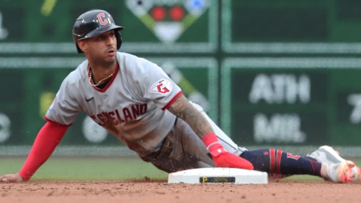 Apr 19, 2025; Pittsburgh, Pennsylvania, USA;  Cleveland Guardians shortstop Brayan Rocchio (left) steals second base without a throw against the Pittsburgh Pirates during the eighth inning at PNC Park. Mandatory Credit: Charles LeClaire-Imagn Images