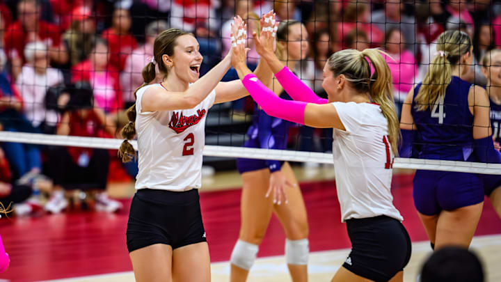 Setter Bergen Reilly high fives middle blocker Andi Jackson after Jackson's kill. The duo each received awards from the AVCA on Friday as the top players at their position. Setter Bergen Reilly high fives middle blocker Andi Jackson after Jackson's kill. The duo each received awards from the AVCA on Friday as the top players at their position.
