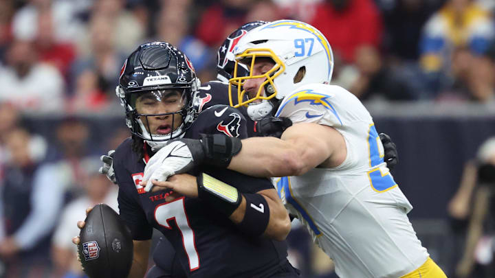 Angeles Chargers outside linebacker Joey Bosa (97) sacks Houston Texans quarterback C.J. Stroud (7) Angeles Chargers outside linebacker Joey Bosa (97) sacks Houston Texans quarterback C.J. Stroud (7)