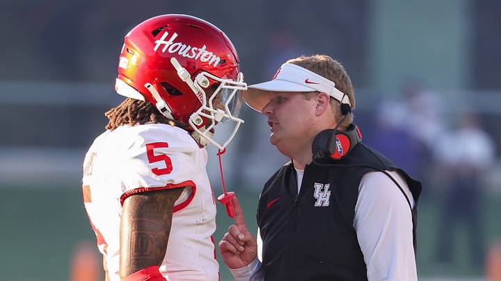 Oct 10, 2026; Manhattan, Kansas, USA; Houston Cougars head coach Willie Fritz talks to defensive back Will James (5) during the fourth quarter against the Kansas State Wildcats at Bill Snyder Family Football Stadium. Mandatory Credit: Scott Sewell-Imagn Images Oct 10, 2026; Manhattan, Kansas, USA; Houston Cougars head coach Willie Fritz talks to defensive back Will James (5) during the fourth quarter against the Kansas State Wildcats at Bill Snyder Family Football Stadium. Mandatory Credit: Scott Sewell-Imagn Images