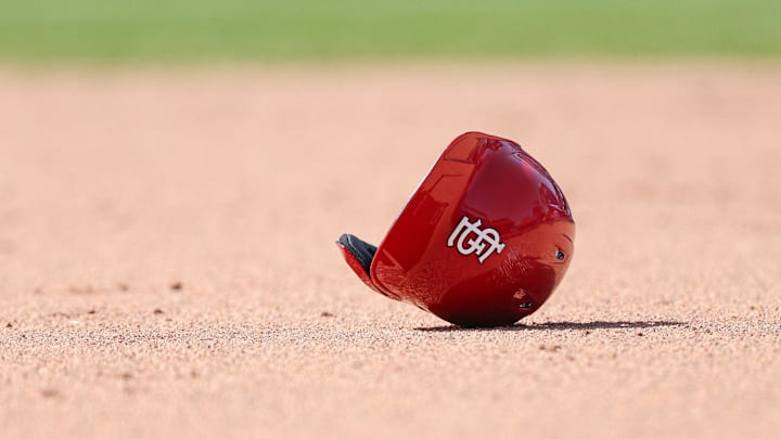 Apr 20, 2025; New York City, New York, USA; The helmet of St. Louis Cardinals right fielder Jordan Walker (not pictured) rests in the base path during the sixth inning against the New York Mets at Citi Field. Mandatory Credit: Vincent Carchietta-Imagn Images
