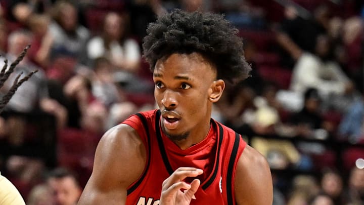 Jan 10, 2026; Tallahassee, Florida, USA; North Carolina State Wolfpack guard Paul McNeil Jr. (2) drives the ball to the net during the second half against the Florida State Seminoles at Donald L. Tucker Center. Mandatory Credit: Melina Myers-Imagn Images