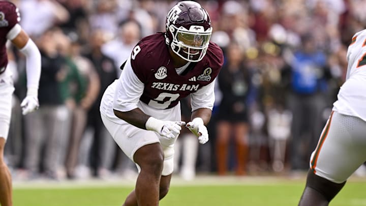 Texas AM Aggies defensive end Cashius Howell lines up during the game between the Aggies and Hurricanes. Texas AM Aggies defensive end Cashius Howell lines up during the game between the Aggies and Hurricanes.