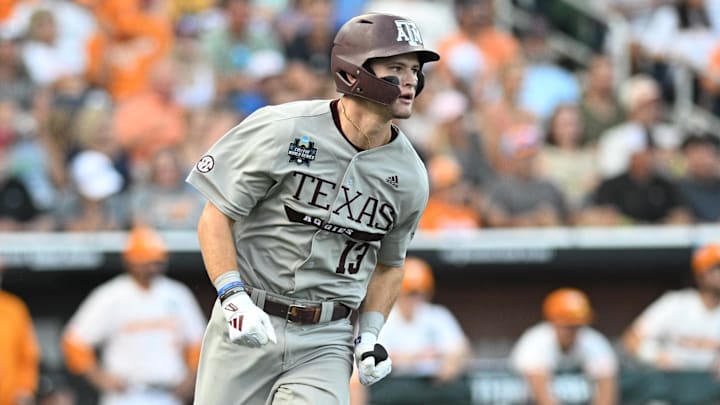 Texas A&M Aggies left fielder Caden Sorrell (13) drives in a run against the Tennessee Volunteers during the first inning at Charles Schwab Field Omaha.