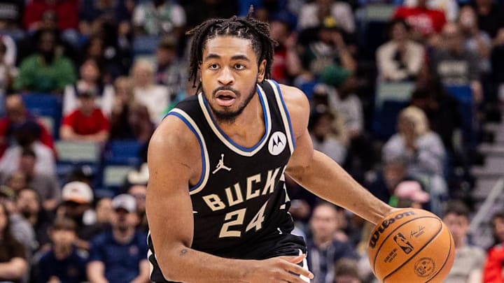 Milwaukee Bucks guard Cam Thomas (24) dribbles against New Orleans Pelicans forward Zion Williamson (1) during the first half at Smoothie King Center. On February 20, 2026.