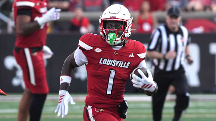 Louisville’s Isaac Brown runs the ball against Virginia at L&N Stadium Saturday.
Oct. 4, 2025