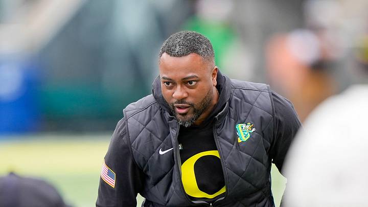 Oregon wide receivers coach Ross Douglas works with players during Oregon’s spring game on April 26, 2025, at Autzen Stadium in Eugene. Oregon wide receivers coach Ross Douglas works with players during Oregon’s spring game on April 26, 2025, at Autzen Stadium in Eugene.