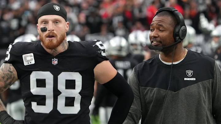 Jan 7, 2023; Paradise, Nevada, USA; Las Vegas Raiders defensive end Maxx Crosby (98) and defensive coordinator Patrick Graham talk during their game against the Kansas City Chiefs in the first half at Allegiant Stadium. Mandatory Credit: Kirby Lee-Imagn Images