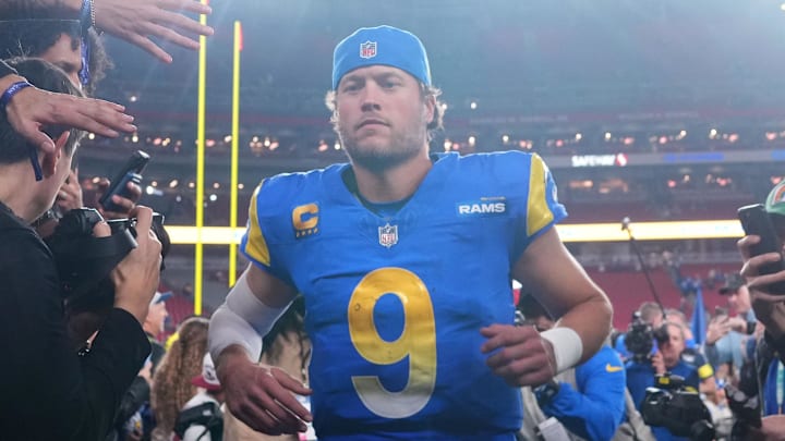 Jan 13, 2025; Glendale, AZ, USA; Los Angeles Rams quarterback Matthew Stafford (9) reacts after the NFC wild card game against the Minnesota Vikings at State Farm Stadium. Mandatory Credit: Joe Camporeale-Imagn Images
