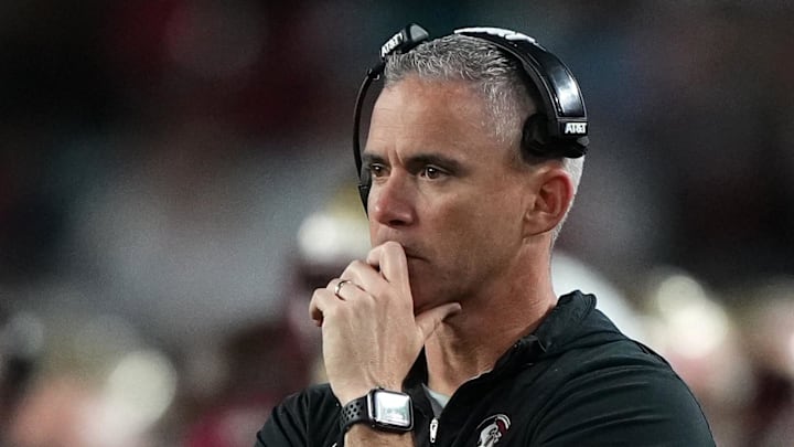 Dec 30, 2023; Miami Gardens, FL, USA; Florida State Seminoles head coach Mike Norvell reacts against the Georgia Bulldogs during the second half in the 2023 Orange Bowl at Hard Rock Stadium. Mandatory Credit: Jasen Vinlove-Imagn Images