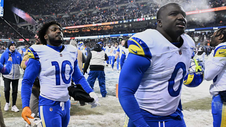 Jan 18, 2026; Chicago, IL, USA; Los Angeles Rams linebackers Josaiah Stewart (10) and Byron Young (0) leave the field after an NFC Divisional Round game against the Chicago Bears at Soldier Field. Mandatory Credit: Matt Marton-Imagn Images