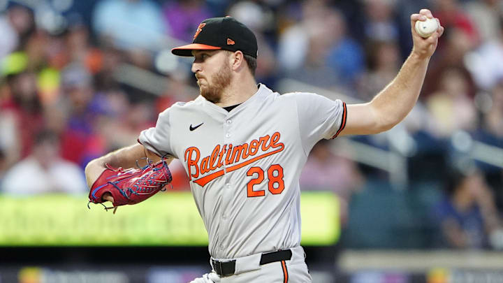 Aug 19, 2024; New York City, New York, USA; Baltimore Orioles pitcher Trevor Rogers (28) delivers a pitch against the New York Mets during the first inning at Citi Field