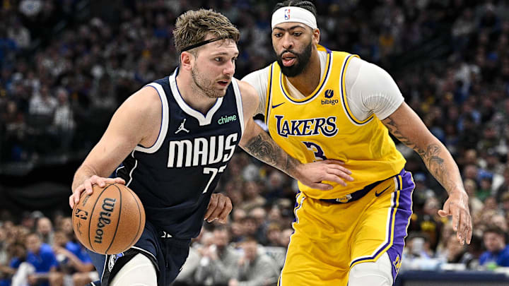 Dec 12, 2023; Dallas, Texas, USA; Dallas Mavericks guard Luka Doncic (77) and Los Angeles Lakers forward Anthony Davis (3) in action during the game between the Dallas Mavericks and the Los Angeles Lakers at the American Airlines Center. Mandatory Credit: Jerome Miron-Imagn Images
