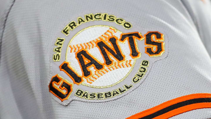 The San Francisco Giants logo on the sleeve of a baseball player.
