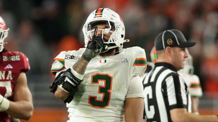 Jan 19, 2026; Miami Gardens, FL, USA; Miami Hurricanes defensive lineman Akheem Mesidor (3) celebrates after a sack against the Indiana Hoosiers in the third quarter during the College Football Playoff National Championship game at Hard Rock Stadium. Mandatory Credit: Sam Navarro-Imagn Images