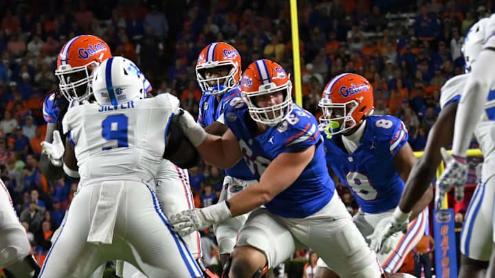 Florida Gators center Jake Slaughter will return for a final season with the program. Florida Gators center Jake Slaughter will return for a final season with the program.